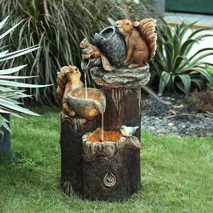 Solarbetriebener Gartenbrunnen | Ente & Eichhörnchen Harzstatue